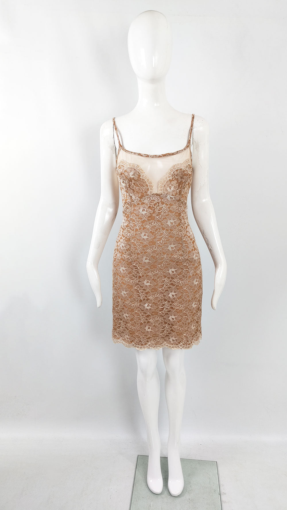 A sexy vintage y2k dress by Jiki of Monte Carlo in a tan chiffon with a lace overlay and a mini, sleeveless design.