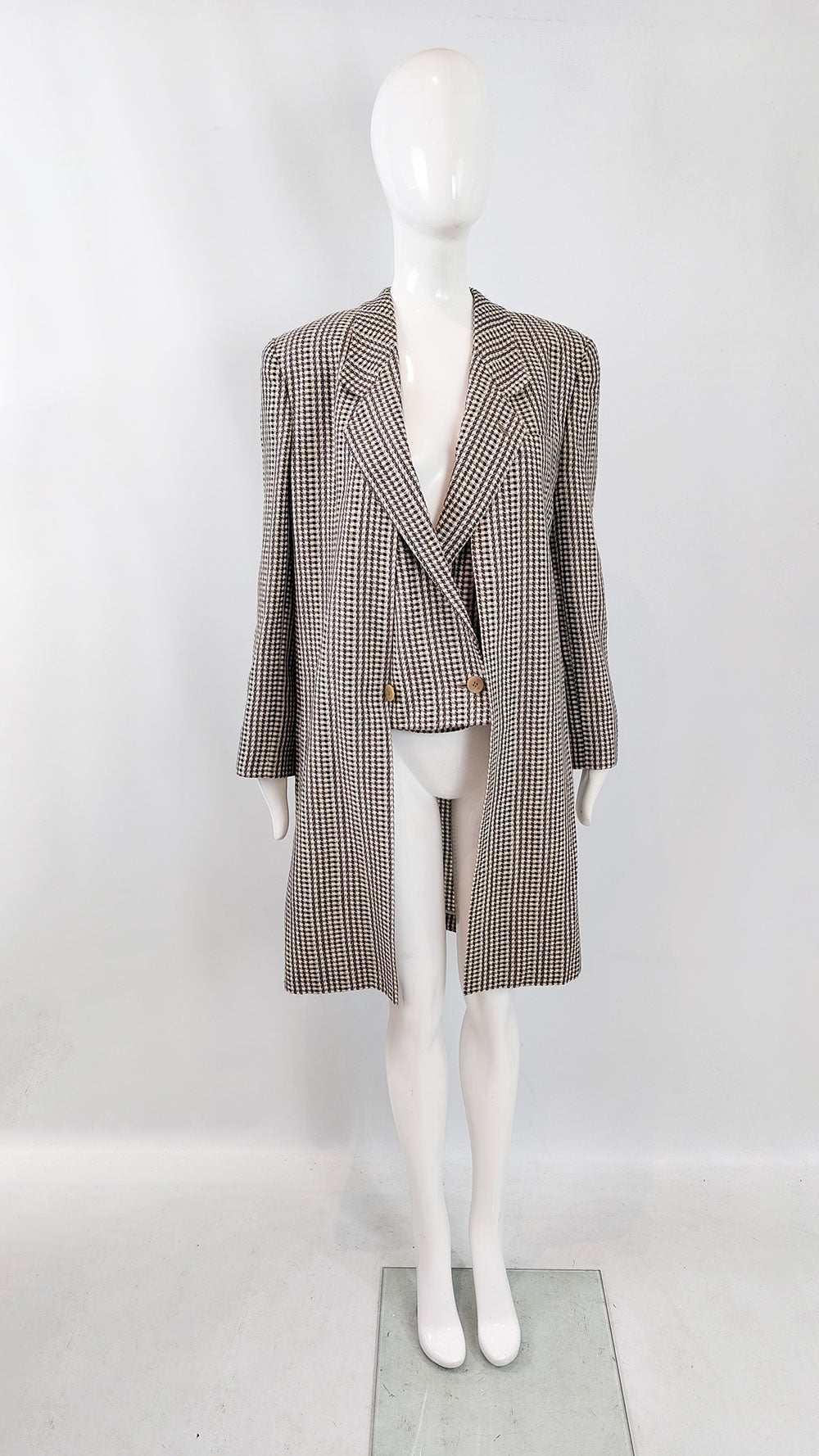 A vintage Giorgio Armani coat from the 1980s in a white, brown and black tweed.