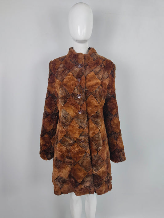 A vintage Caroline Charles Spring 2006 patchwork faux fur coat, lined in silk.