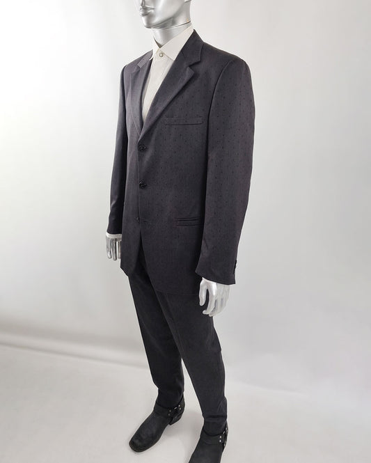 A vintage Gianni Versace grey and black polka dot wool mens trouser suit.