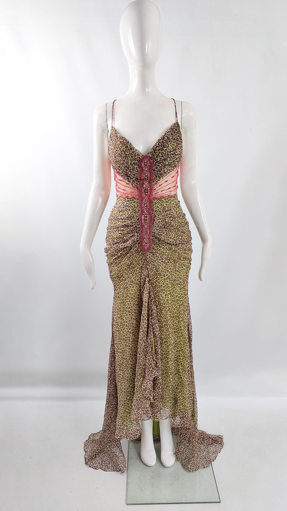 A glamorous vintage dress from the 2000s by Sagaie paris with a leopard print throughout the silk fabric and a sheer mesh at the waist.