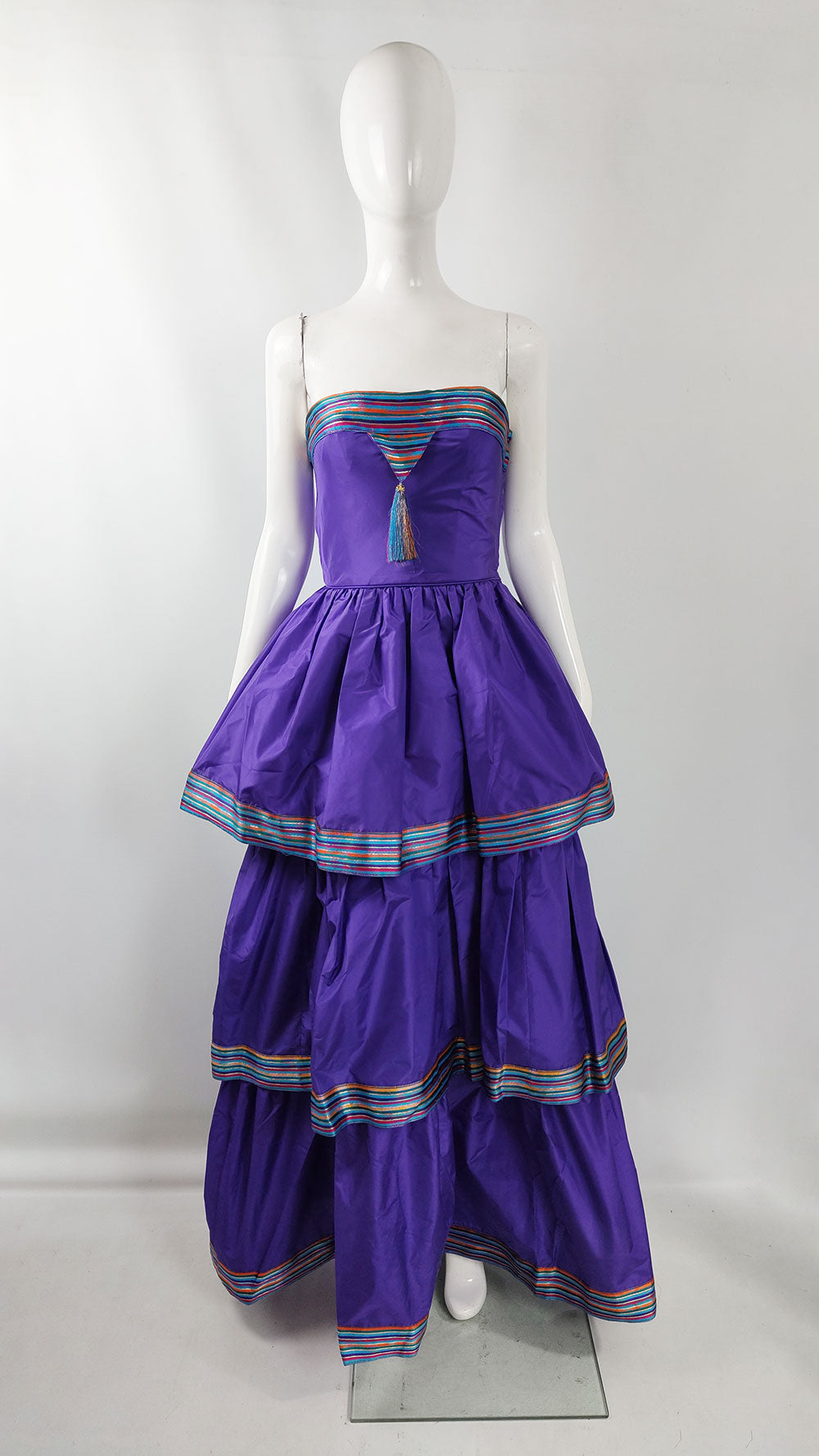 A vintage purple silk evening dress with tiered design by Bellville Sassoon.
