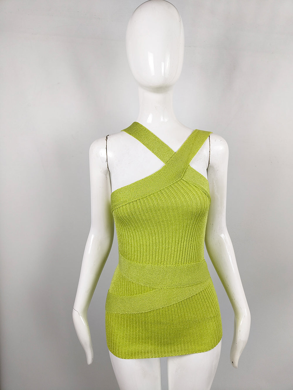 A vintage Calude montana knit top with asymmetric sleeves. 
