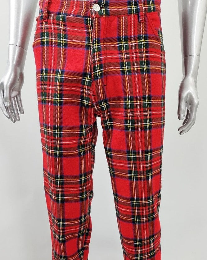 A vintage pair of original vintage punk pants in a red tartan fabric.