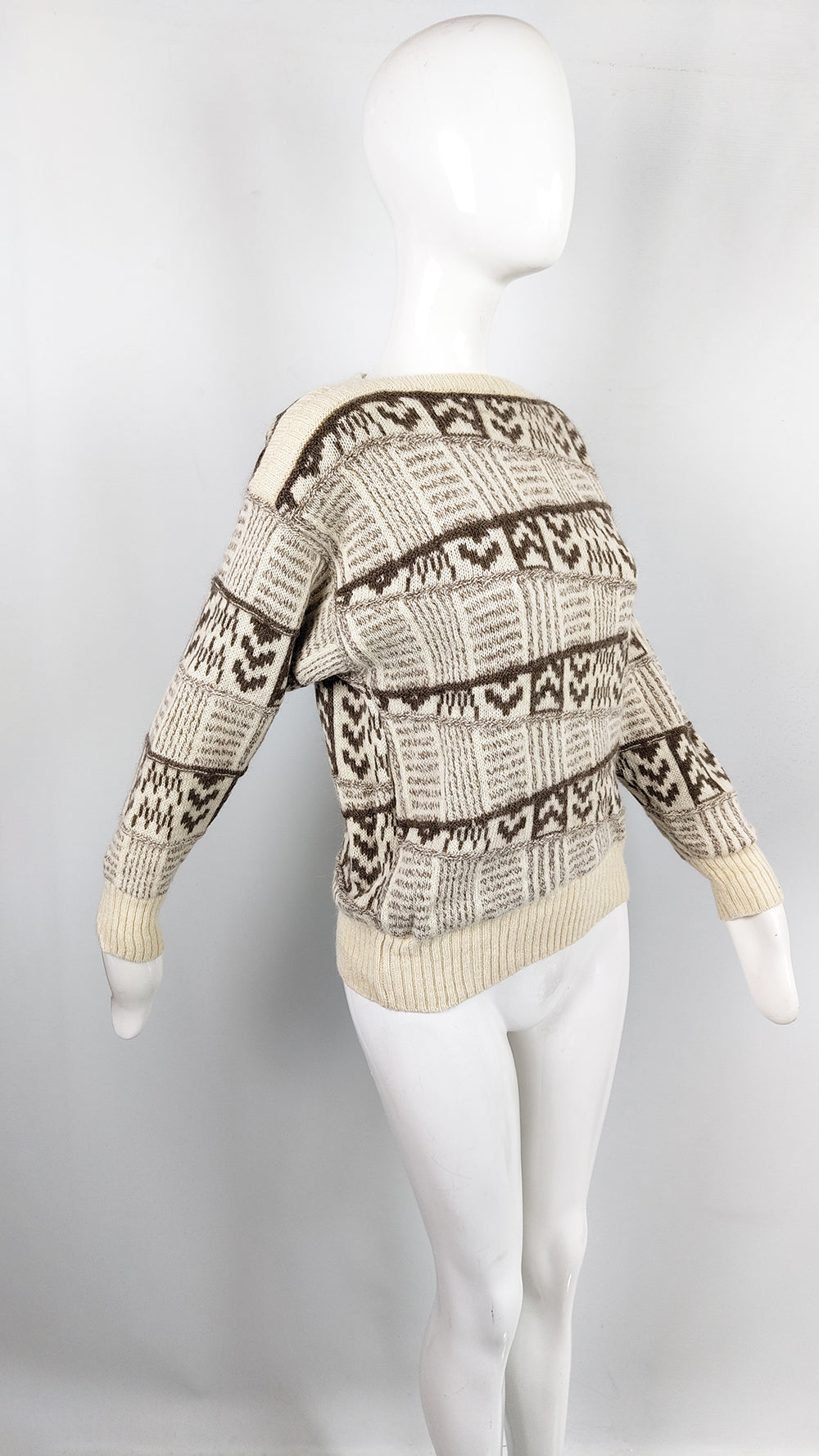An Escada Vintage Alpaca and wool blend sweater or jumper from the 1980s with a brown textured pattern throughout.