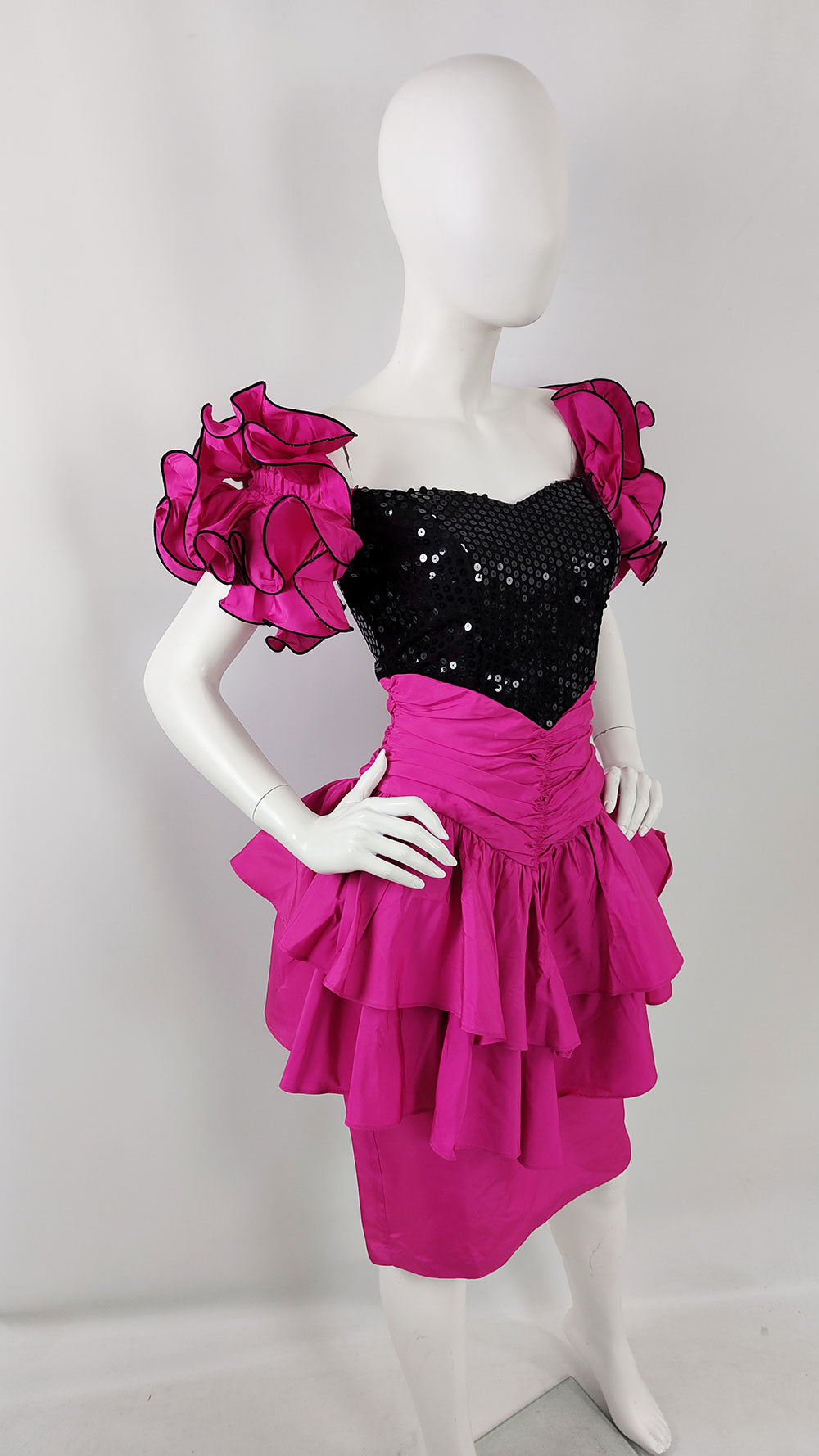 A true vintage 1980s prom dress in black and pink by American label, TNB.