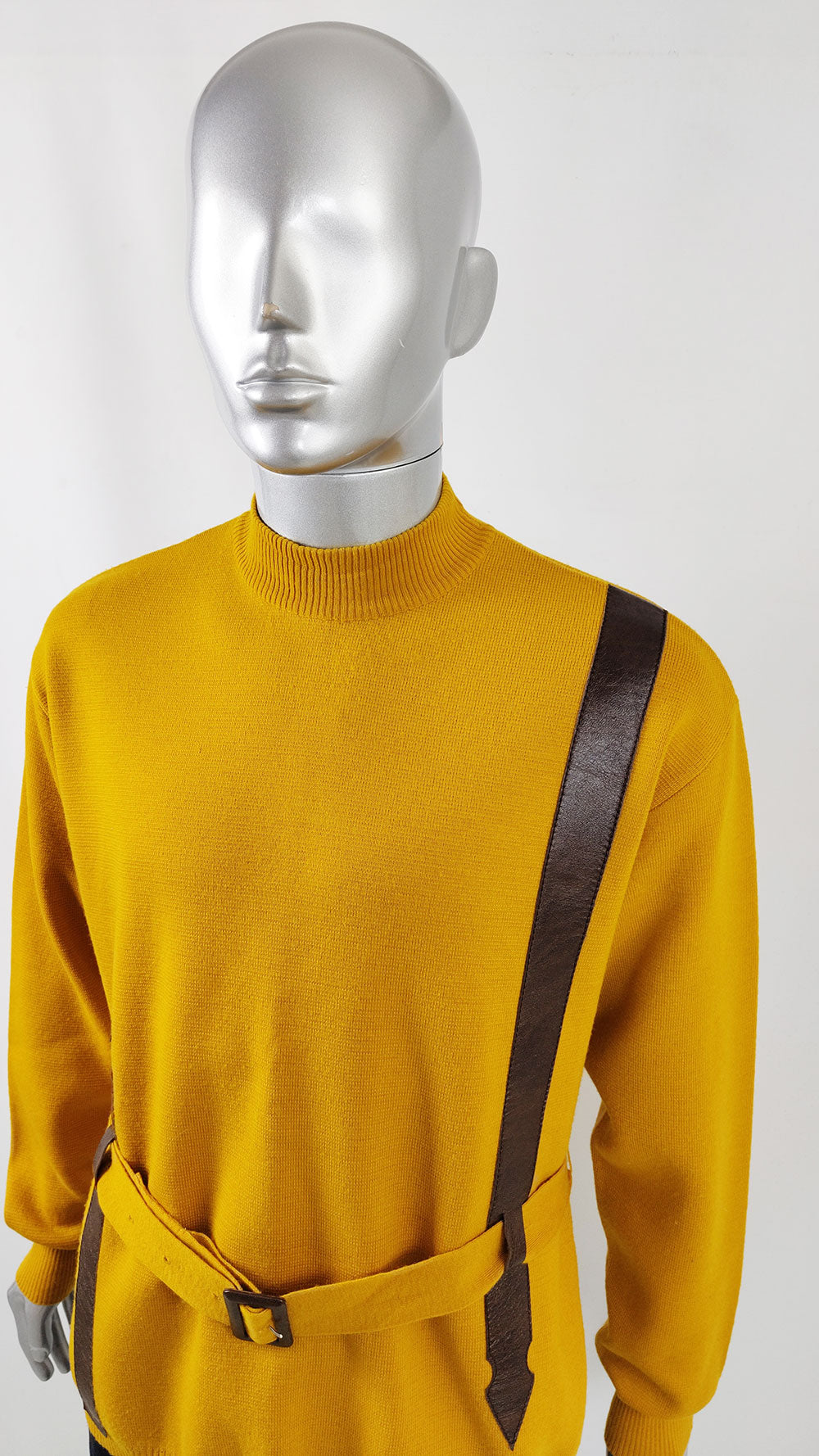 Mustard yellow wool jumper with dark brown plastic appliques and belt. A must-have for any fashion-forward collector.