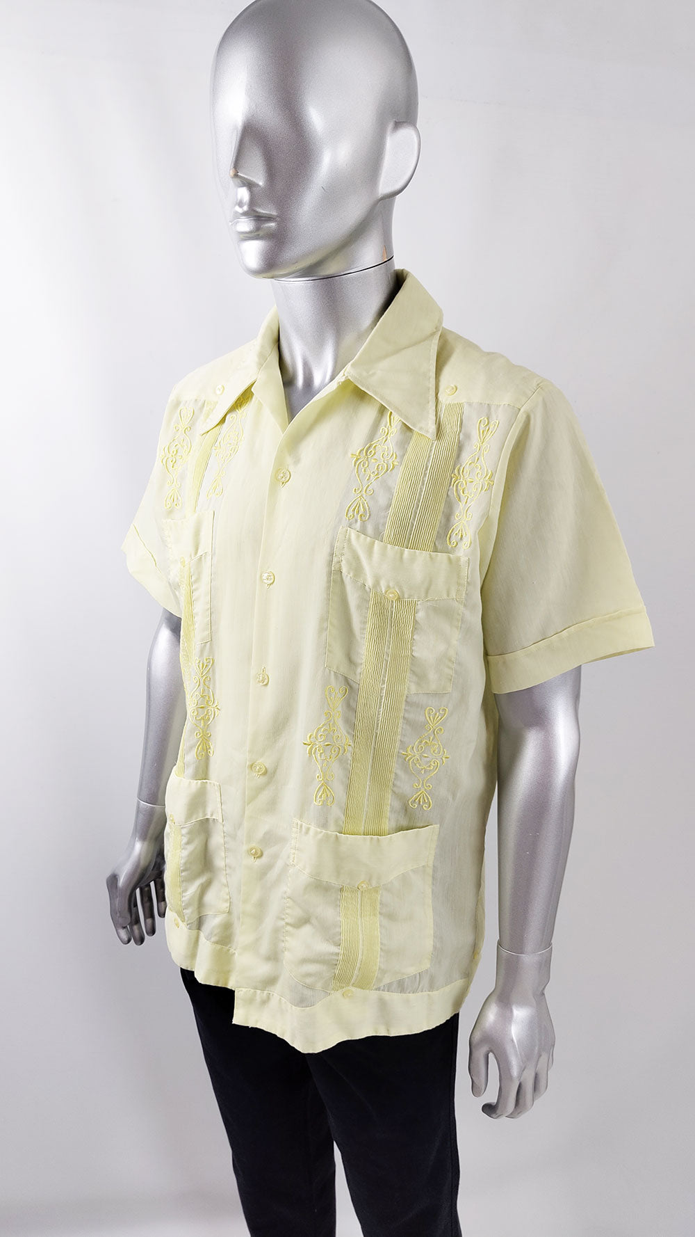 A vintage vacation shirt in a pale yellow see through cotton blend fabric.
