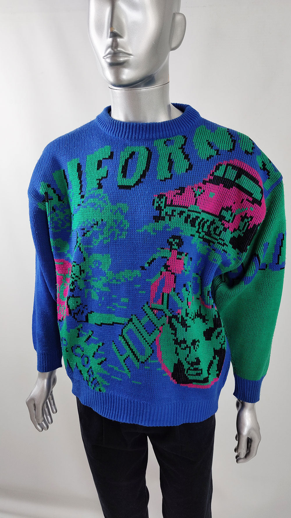 A vintage 80s mens sweater in a trippy blue and green knit acrylic and mohair fabric.