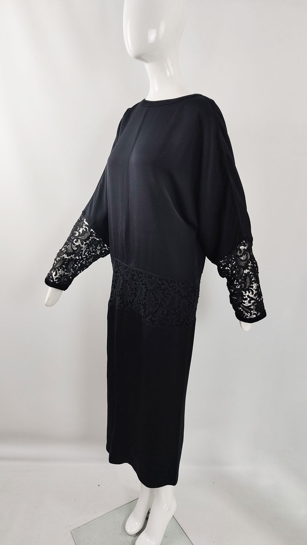An iconic vintage batwing dress from the 80s by Gianni Versace for the A/W 1985 collection.