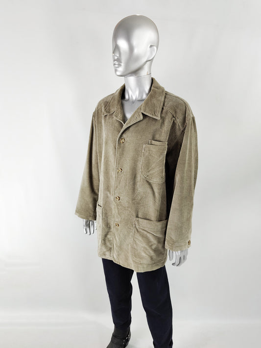 An image of a mannequin wearing a mens vintage corduroy coat from the 1990s by Camel Collection.