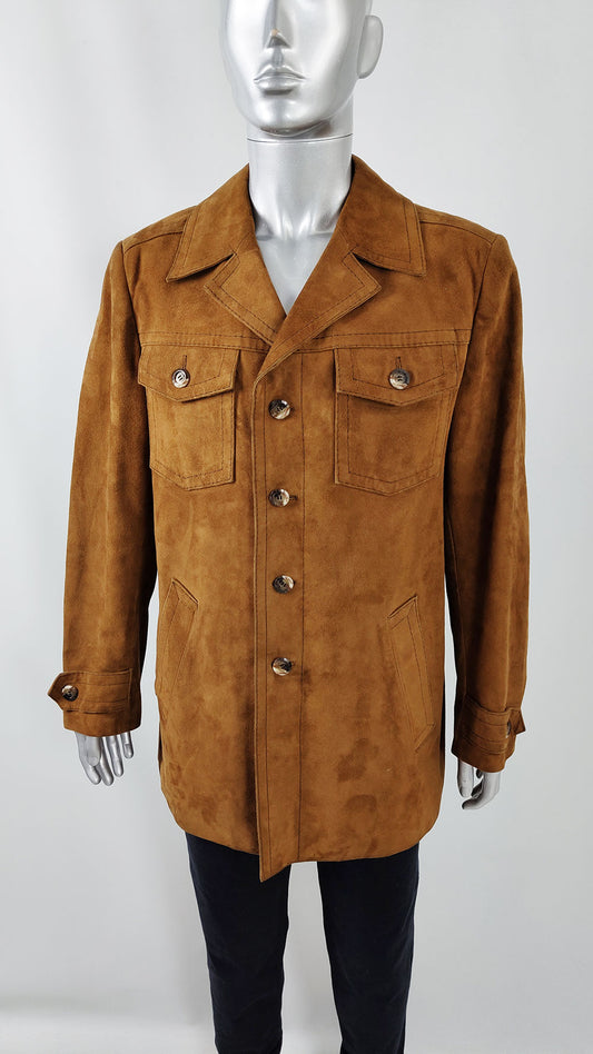 A male mannequin wearing a vintage brown real suede jacket from the late 1960s with buttons down the front and two breast pockets.