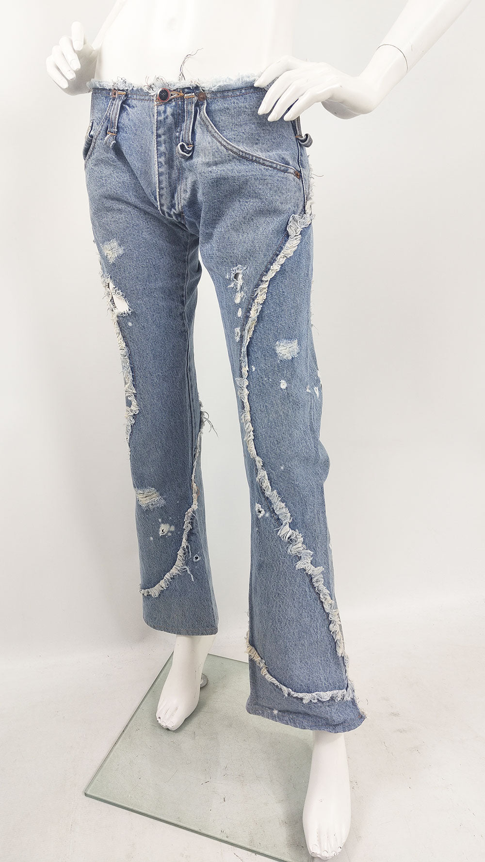 Blue vintage low waisted jeans from the early 2000s by British designer, Andrew Mackenzie.