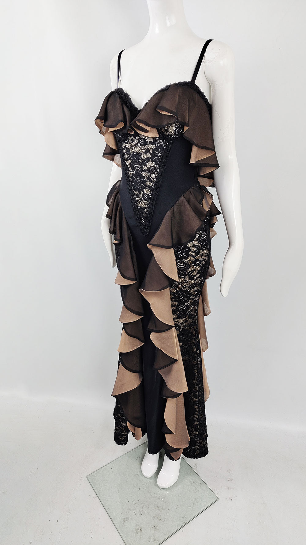 An image of a vintage Catwalk Collection dress from the 90s with lace, satin and chiffon ruffles adding a sexy look.
