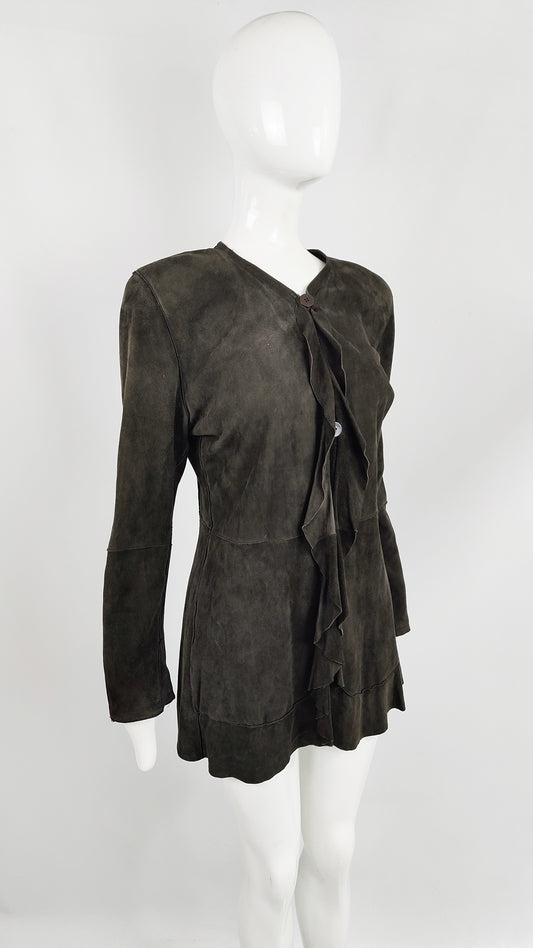 A vintage womens Goat suede jacket from the 1980s with large shoulder pads and a ruffled collar.